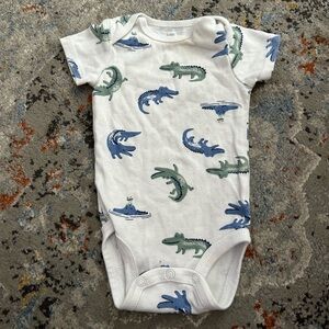 Alligator onesie
